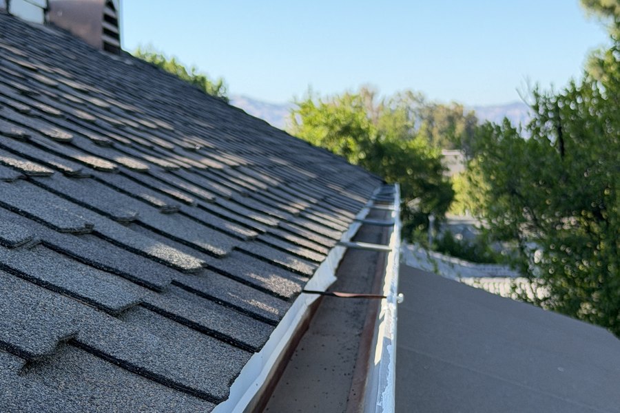 A Valley home with clear, free-running gutters along the roofline